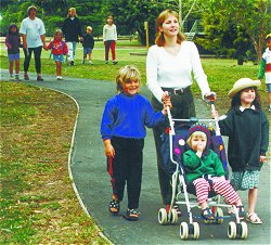 This is how it's done! Elizabeth Moore walks with (from left) Amy, Tayla and Nikii