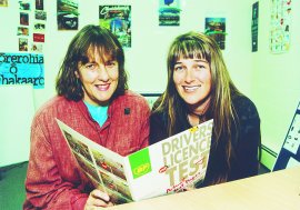 Helping people learn to read and write are Maureen Vance, from ARAS, and Sharon Reid, Literacyworks.