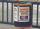 Warning - Don't jump off the pier