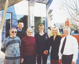 Thrilled with their new premises are staff members
(from left) Ivan Richards, Rod Whearty, Lois Anderson, Kate Rathbun, Heather Johnston and
Peter Dow.