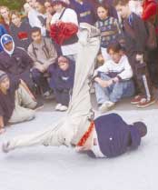 Break-dancing at the opening of Jellie Park's skateboard facility