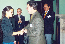 Scholarship recipient Bianca Nuku is congratulated by Garry Moore