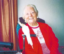 Lily Carpenter and her cockatiel