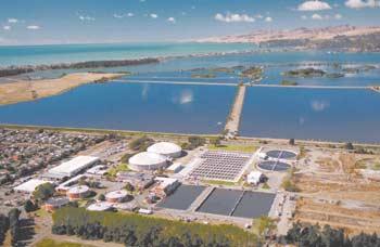 Looking south east towards the ocean over the city’s wastewater treatment plant and oxidation ponds.