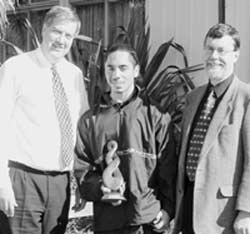 Mayor Garry Moore recently presented a Live Tall award to Aranui High School student Te Kerei Moka, one of six young people from around the world selected to join a United Nations Special Session on Children in New York. At left is school principal Graeme Pollock.