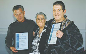 Colin Ford and Richard Gamblin with Cr Carole Evans, the Deputy Mayor. Messrs Ford and Gamblin were nominated for their seven years of work with the Parklands Handiscope.