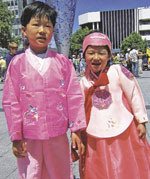 Five-year-old Jasmine Rou and her big brother Justin (7) joined a large crowd in Cathedral Square on 20 November for a celebration of Korean culture. Jasmine and Justin go to Merrin School.