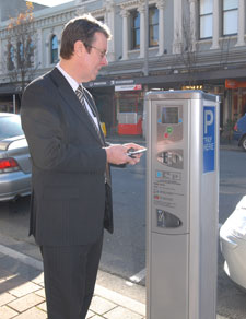 Mayor Garry Moore uses the first of Christchurchs new Pay-and-Display parking machines start working in High Street.
