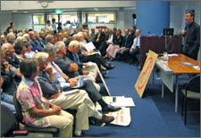 Mayor Garry Moore addressing a meeting called to discuss height provisions in the City Plan and the proposed development at Ferrymead. 