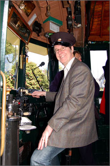 Mayor driving Tram 178 as it circumnavigated the city centre for the 100,000 time.