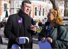 Mayor Garry Moore helps Women's Refuge by collecting donations in Cathedral Square.